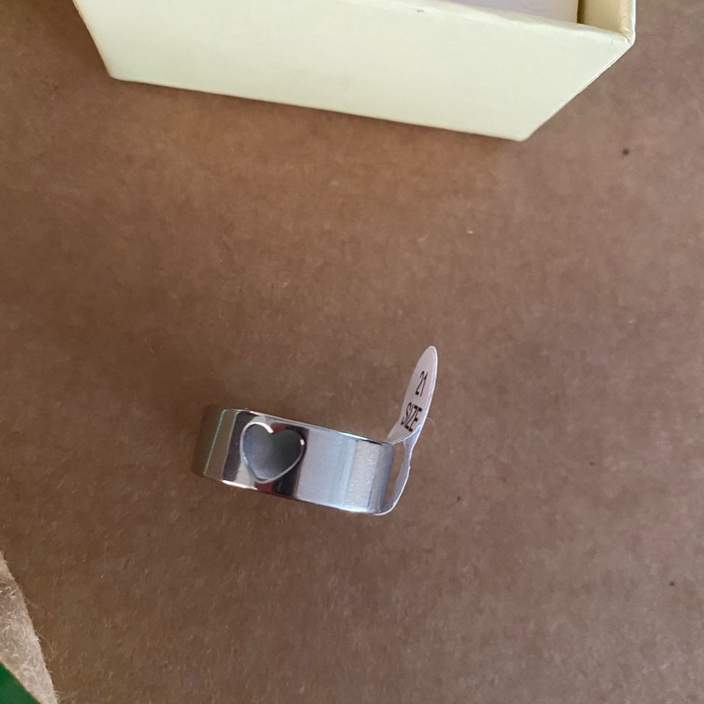 Stainless steel ring with heart cutout